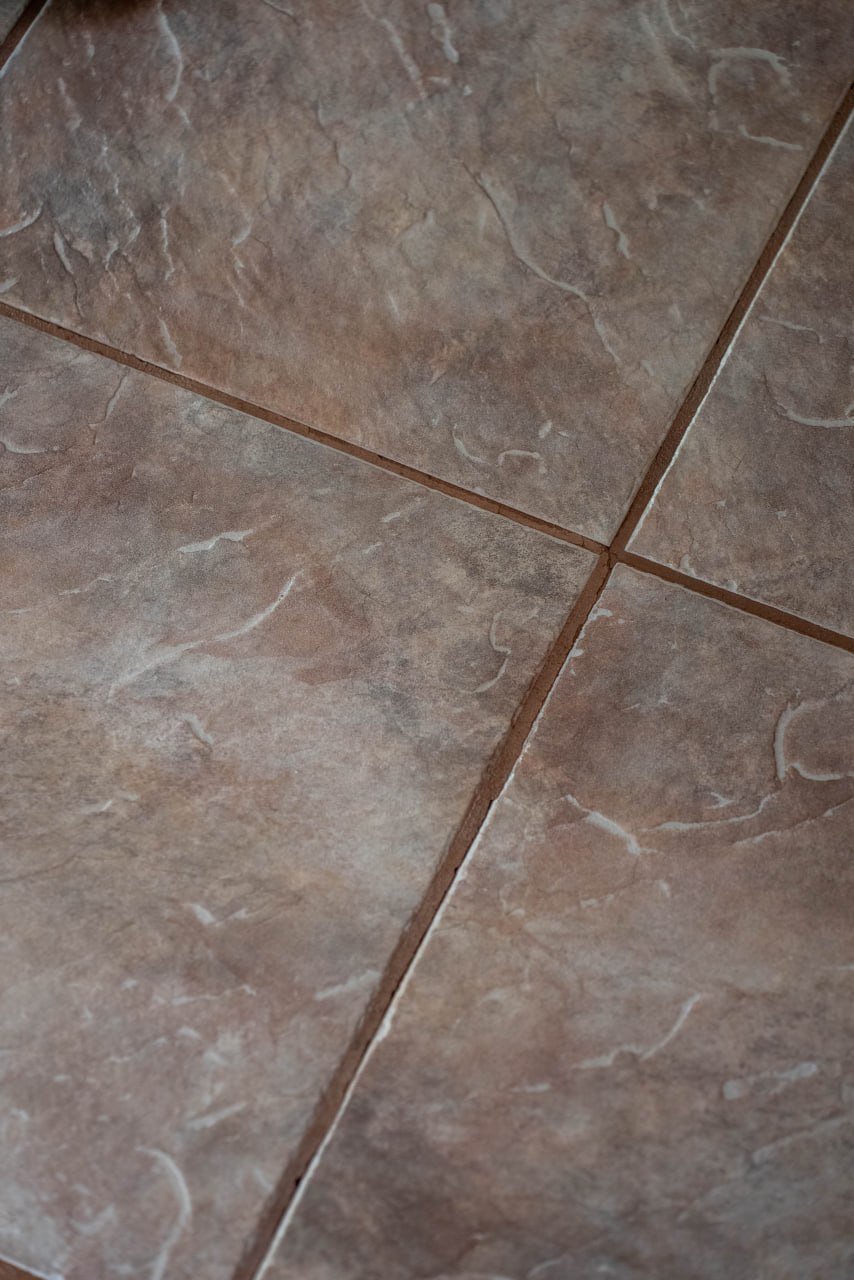 After professional grout cleaning — restored clean grout lines